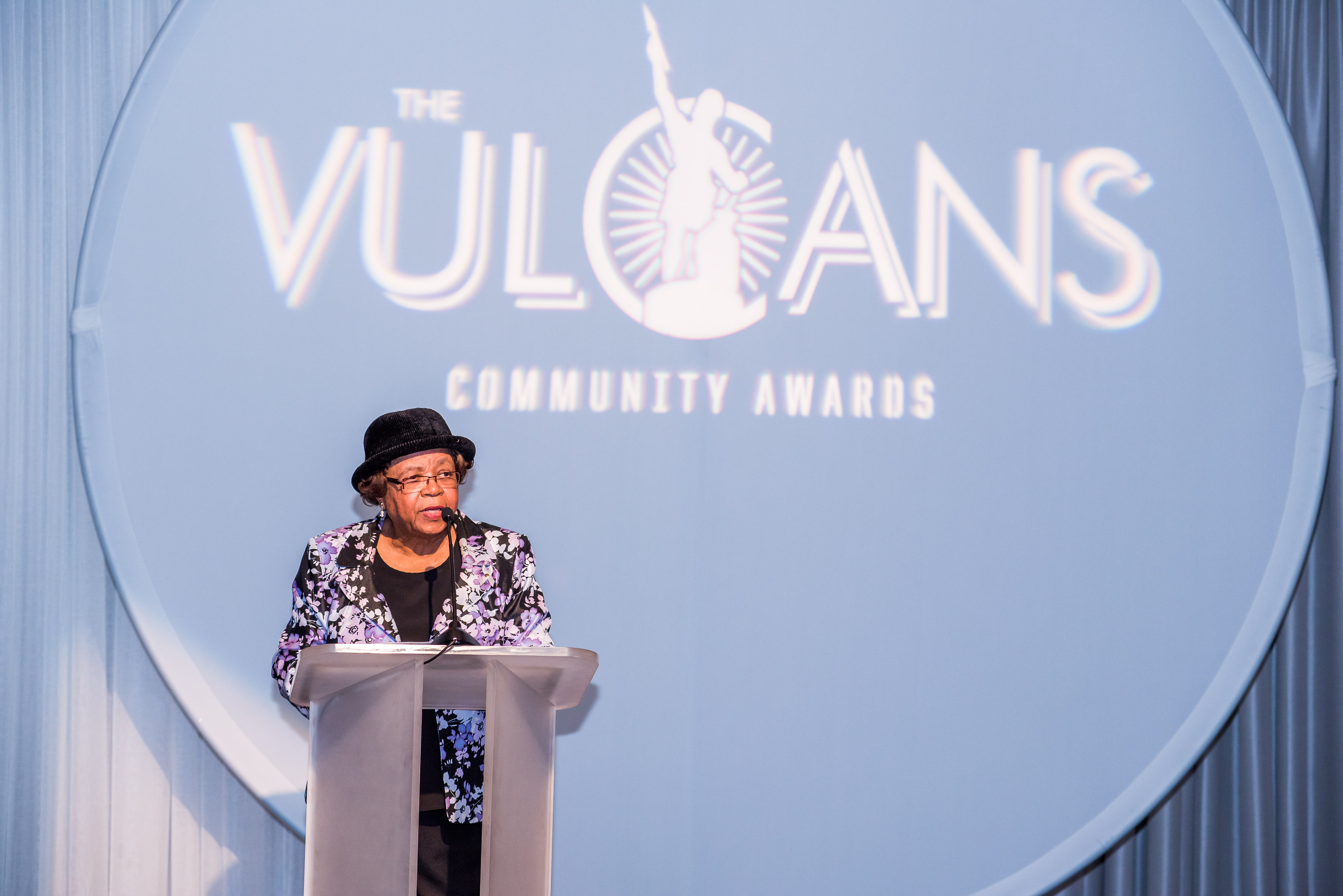 Speaker at Podium at Vulcan Community Awards