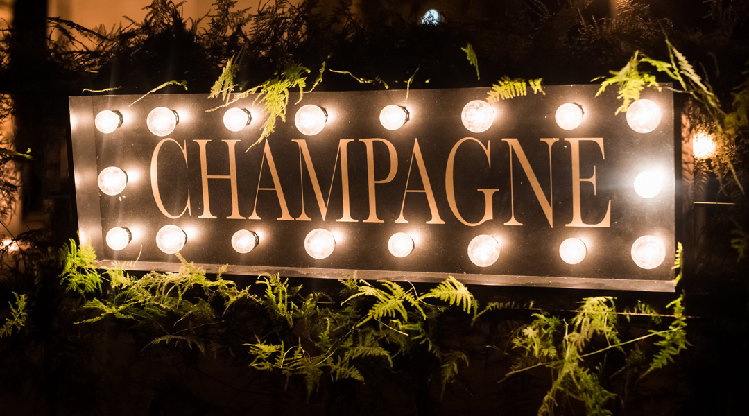 Lighted champagne sign