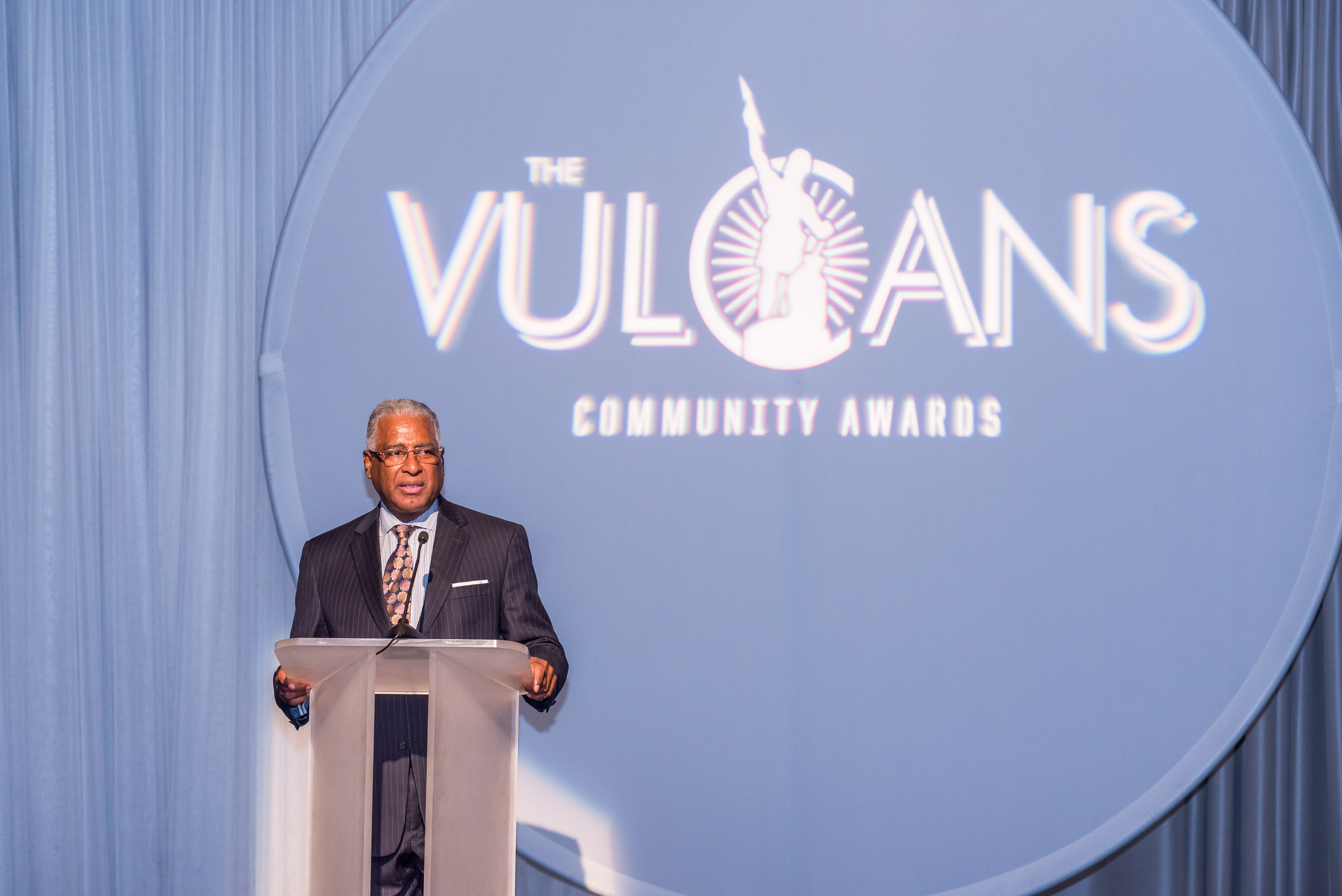 Speaker at Podium at Vulcan Community Awards