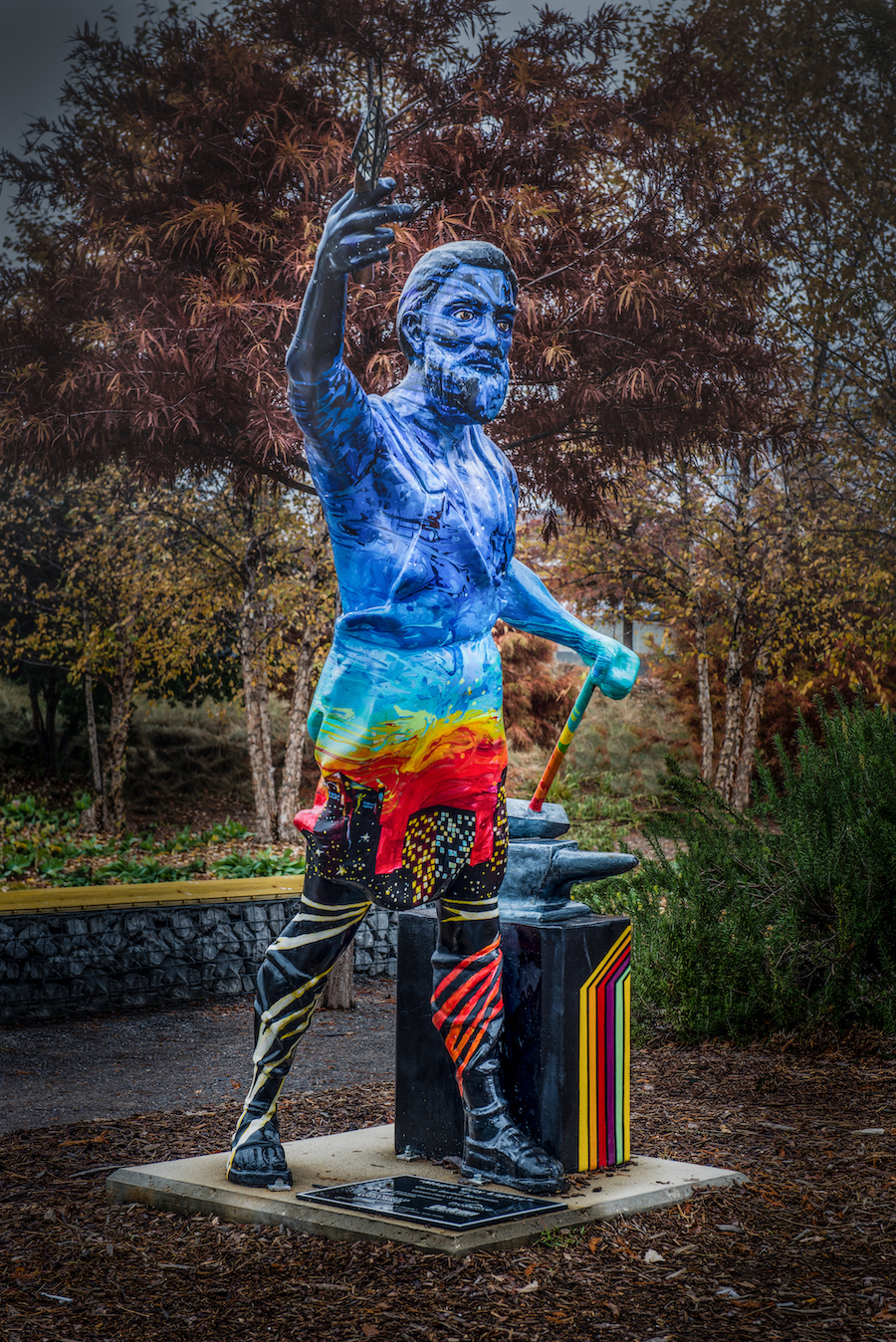 Decorated rainbow vulcan statue